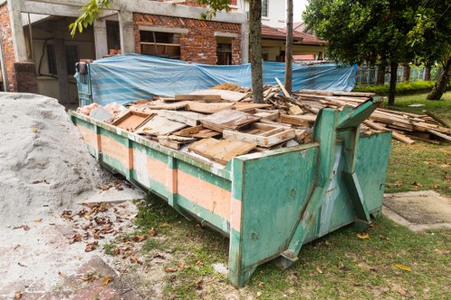 Midi skip placed in a garden for waste disposal