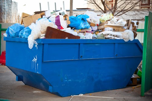 Construction site with builders waste being removed