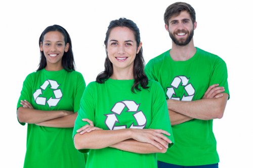Workers sorting demolition waste materials
